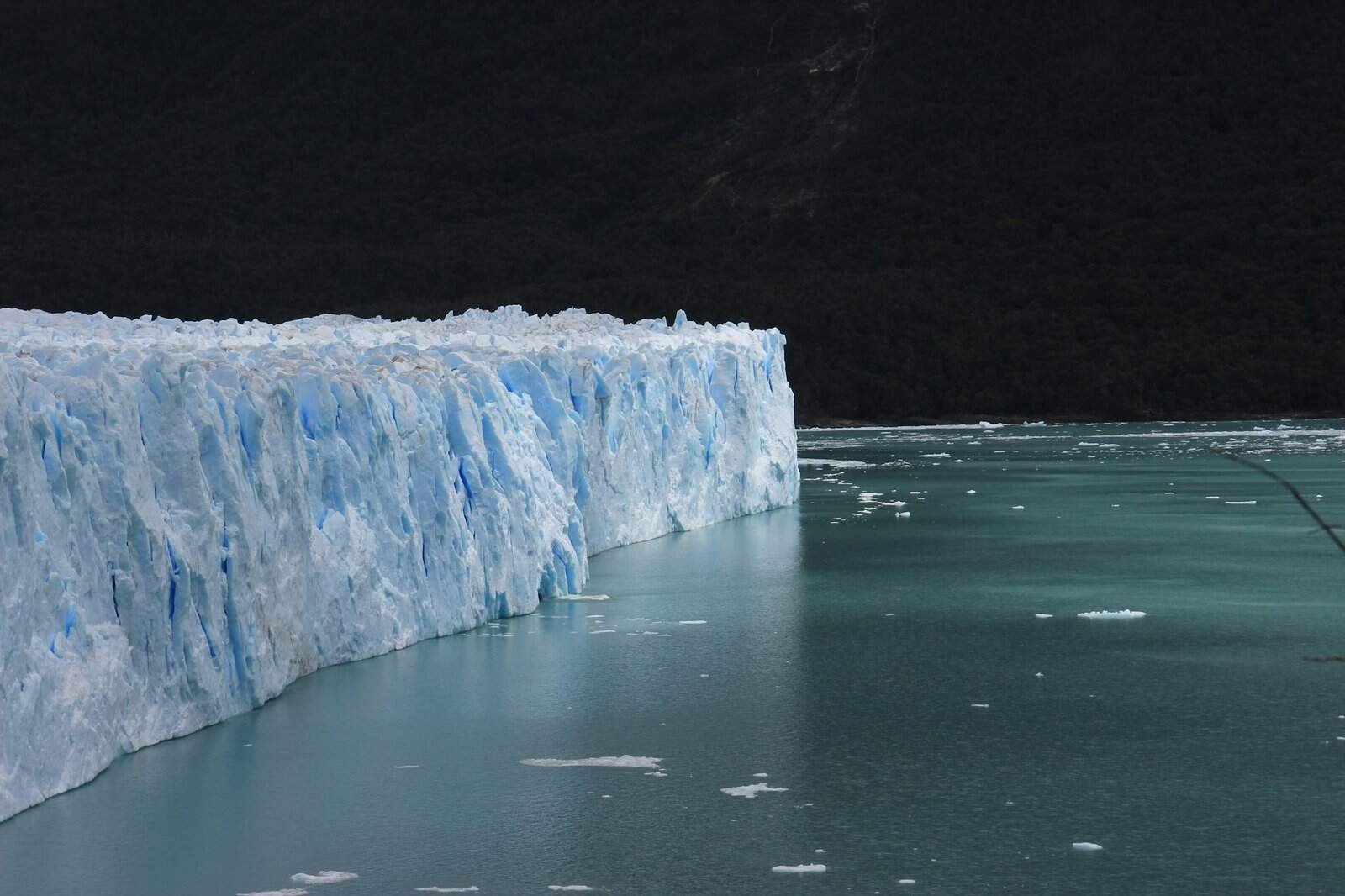 Stunning glacial iceberg floating in serene Antarctica waters, capturing the essence of polar beauty. One of Natural Wonders.